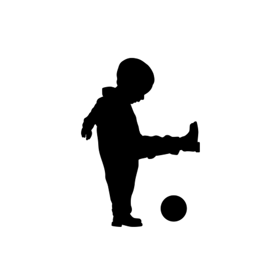 child kicking ball
